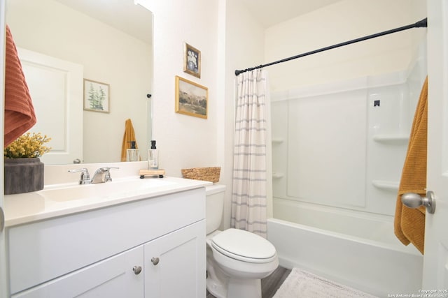 full bathroom with vanity, toilet, and shower / bath combo with shower curtain