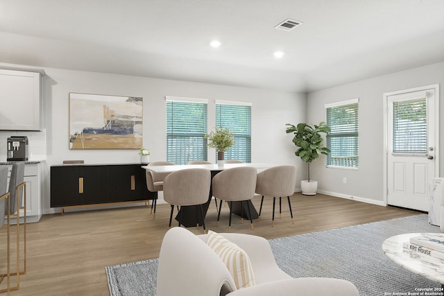 dining room featuring light hardwood / wood-style flooring