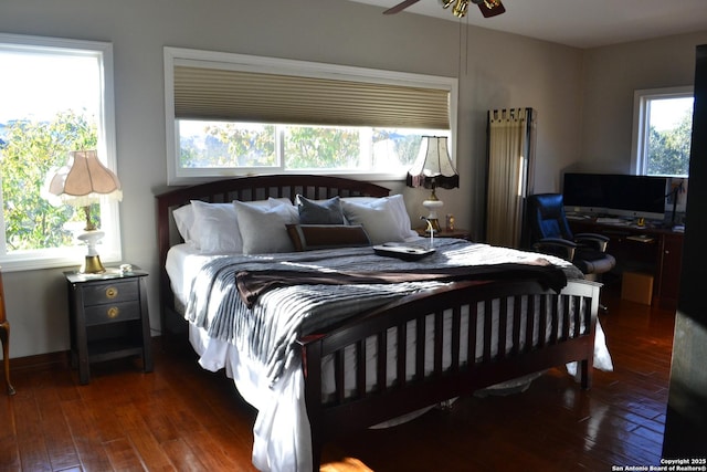 bedroom featuring dark wood-type flooring and ceiling fan