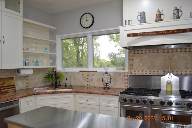 kitchen with white cabinetry, dishwashing machine, sink, and range with two ovens