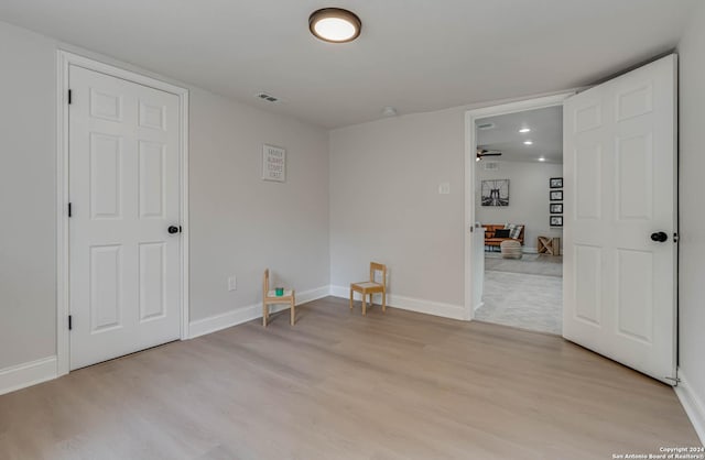 unfurnished room featuring light wood-type flooring