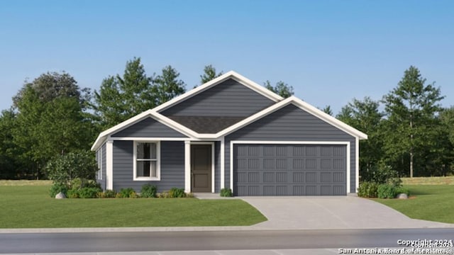 view of front of property featuring a garage and a front lawn