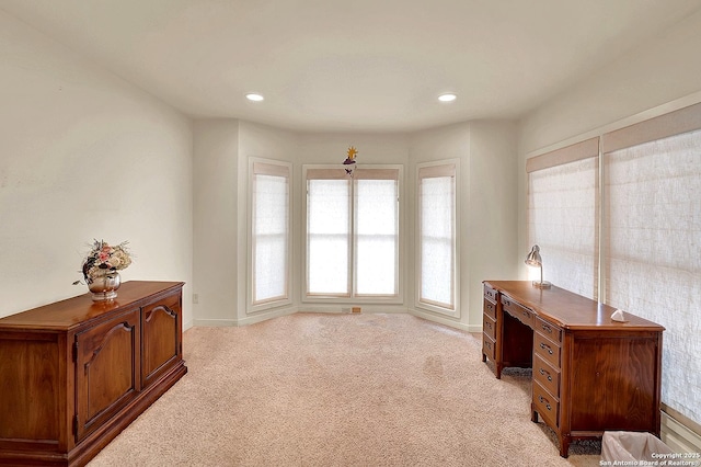 office area with light colored carpet