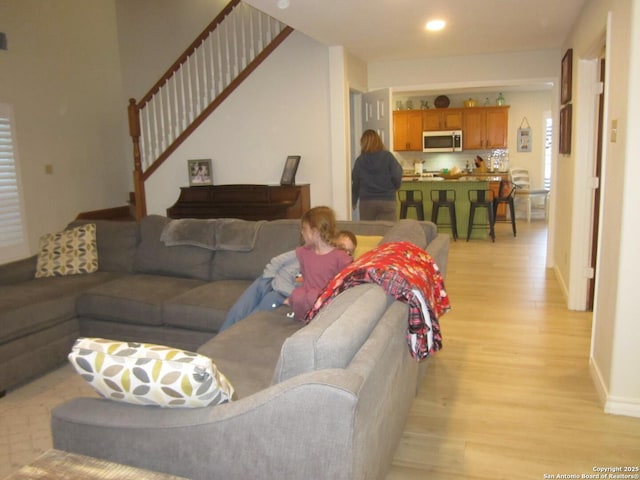 living room with light hardwood / wood-style floors