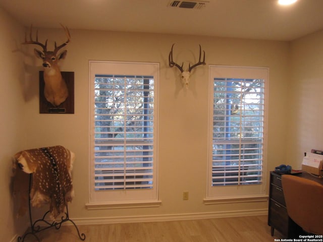 dining room with light wood-type flooring