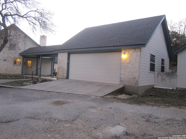 view of front of home with a garage