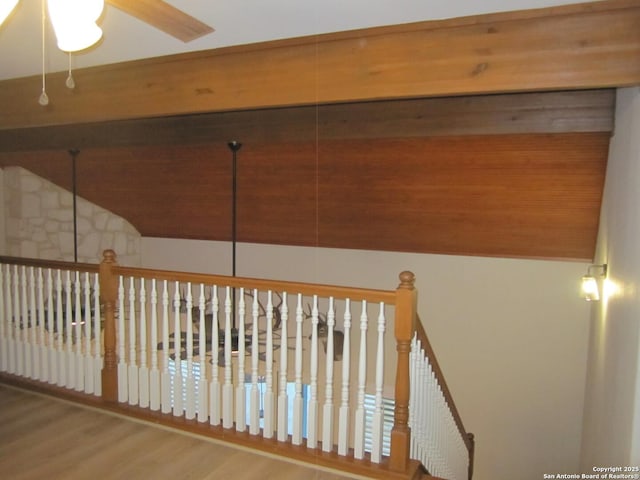 interior space featuring wood-type flooring and lofted ceiling