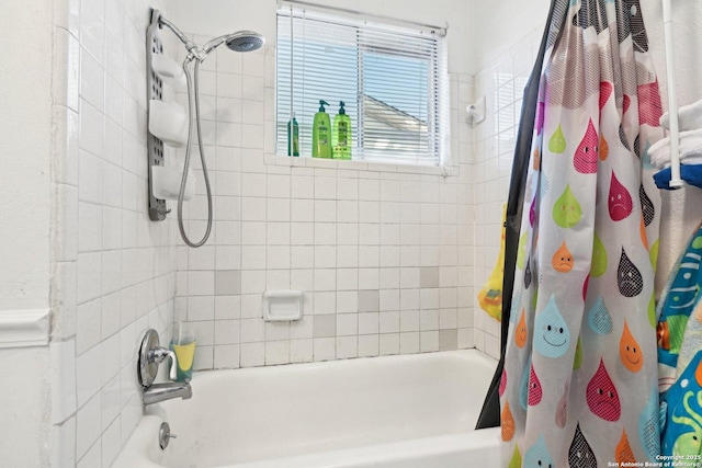 bathroom with shower / bath combination with curtain