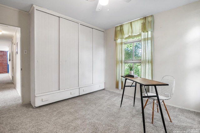 office space with light colored carpet and ceiling fan