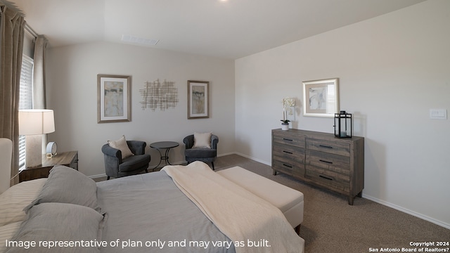 bedroom featuring lofted ceiling and carpet flooring