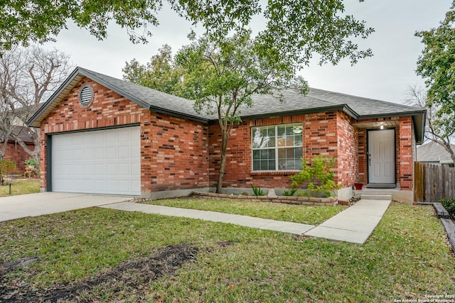 view of front facade featuring a garage and a front yard