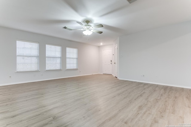 unfurnished room featuring ceiling fan and light hardwood / wood-style flooring