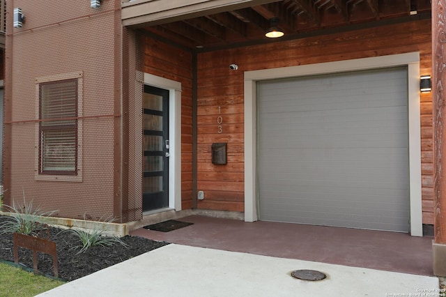 entrance to property with a garage