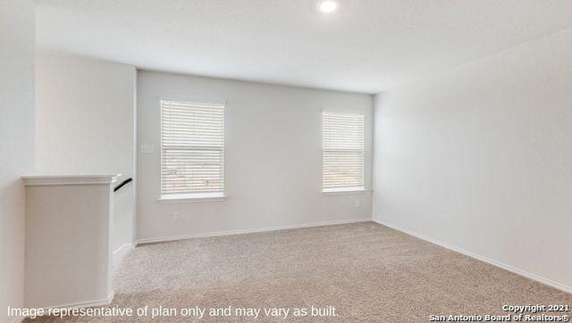 view of carpeted spare room