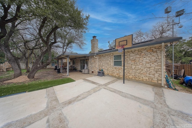 rear view of property featuring a patio area