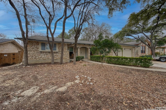 ranch-style home with a garage