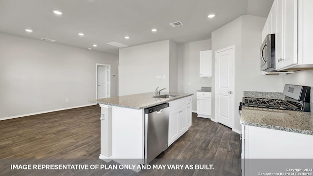 kitchen with white cabinetry, light stone countertops, an island with sink, and appliances with stainless steel finishes