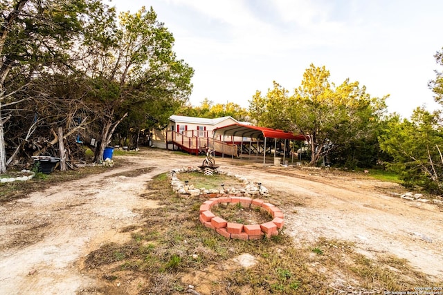 view of yard with a carport