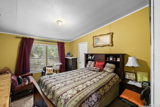 carpeted bedroom featuring lofted ceiling and a textured ceiling