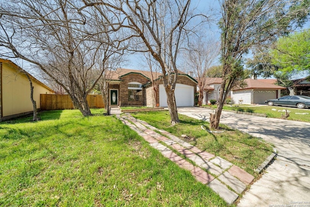 single story home featuring a garage and a front lawn