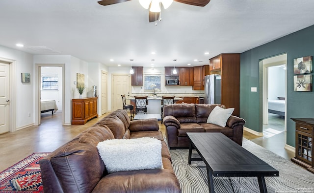 living room featuring ceiling fan