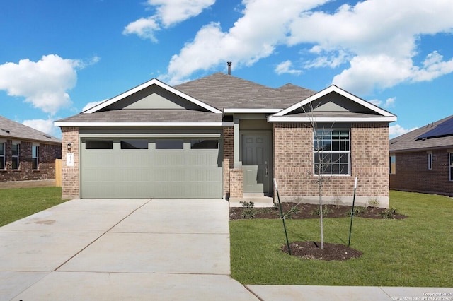 craftsman inspired home featuring a garage and a front lawn