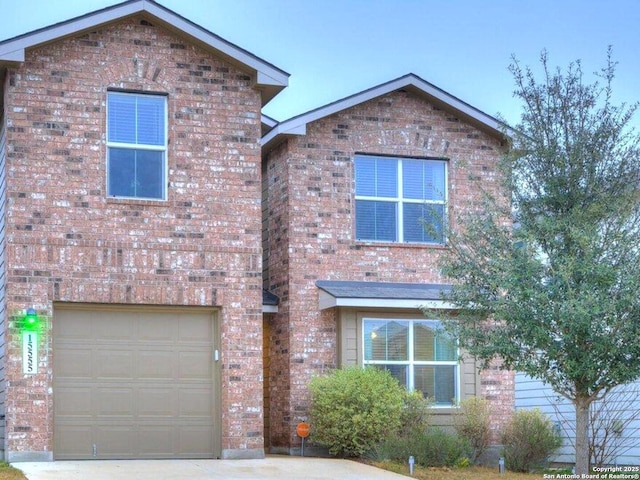 front facade with a garage