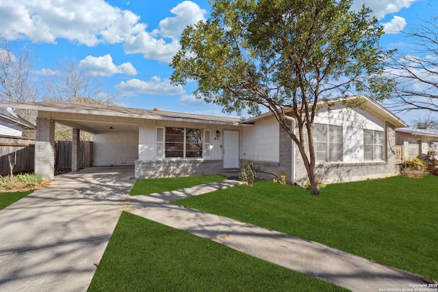 ranch-style house with a front lawn and a carport