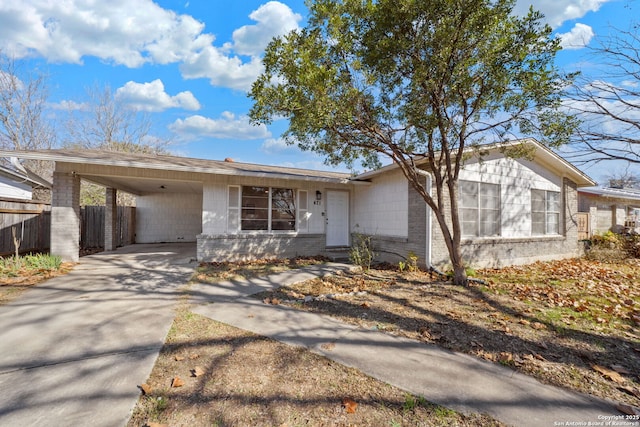 ranch-style house with a carport