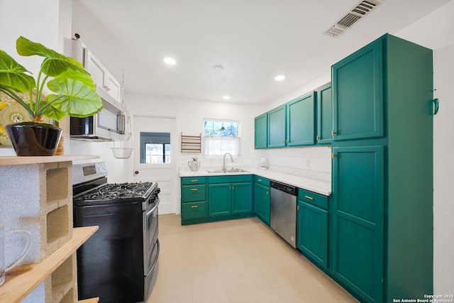 kitchen featuring stainless steel appliances and sink