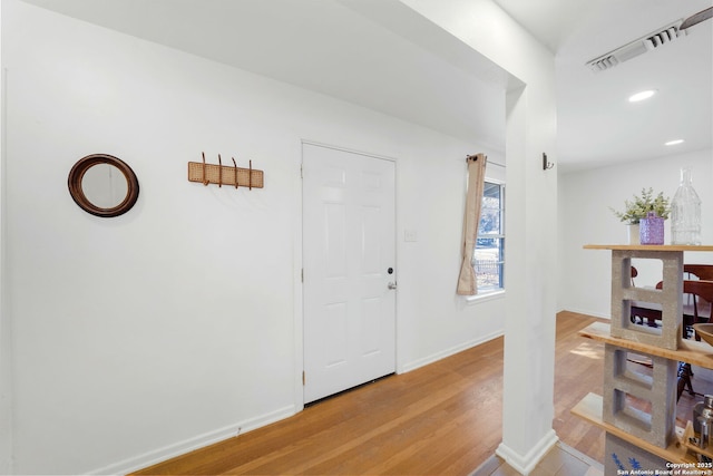 foyer featuring hardwood / wood-style floors