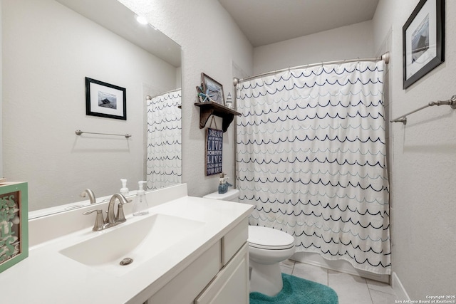 bathroom featuring vanity, tile patterned floors, toilet, and walk in shower