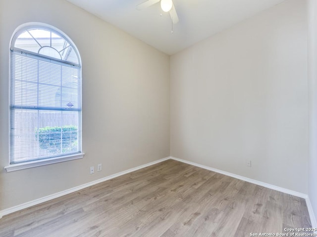 unfurnished room with ceiling fan and light hardwood / wood-style floors