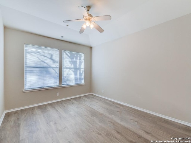 spare room featuring ceiling fan and light wood-type flooring