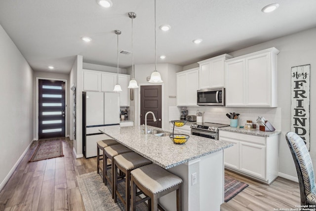 1274 Lennea, New Braunfels, TX 78130 - kitchen with sink, stainless steel appliances, and white cabinets