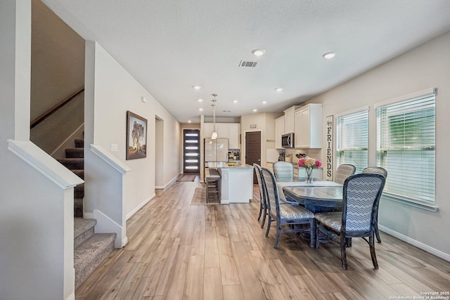 1274 Lennea, New Braunfels, TX 78130 - dining space with light hardwood / wood-style floors