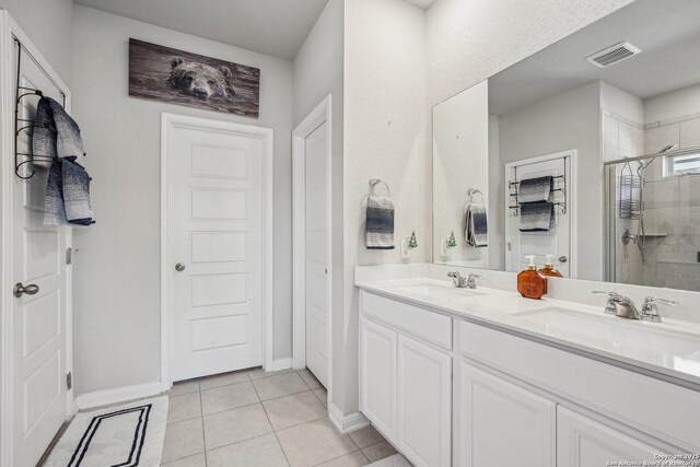 1274 Lennea, New Braunfels, TX 78130 - bathroom with vanity, tile patterned floors, and walk in shower