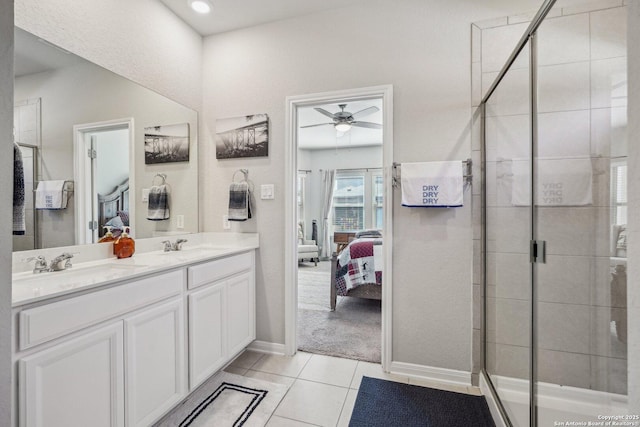 1274 Lennea, New Braunfels, TX 78130 - bathroom with walk in shower, ceiling fan, vanity, and tile patterned flooring