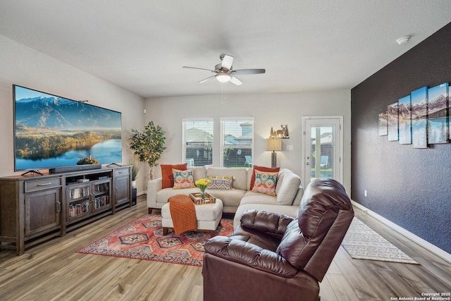 1274 Lennea, New Braunfels, TX 78130 - living room featuring ceiling fan and light hardwood / wood-style floors