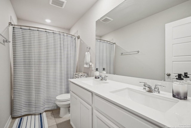 1274 Lennea, New Braunfels, TX 78130 - bathroom featuring tile patterned flooring, vanity, walk in shower, and toilet
