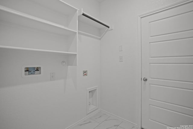 10257 Bartenheim Dr, Schertz, TX 78154 - laundry area with gas dryer hookup, light marble finish flooring, washer hookup, baseboards, and electric dryer hookup