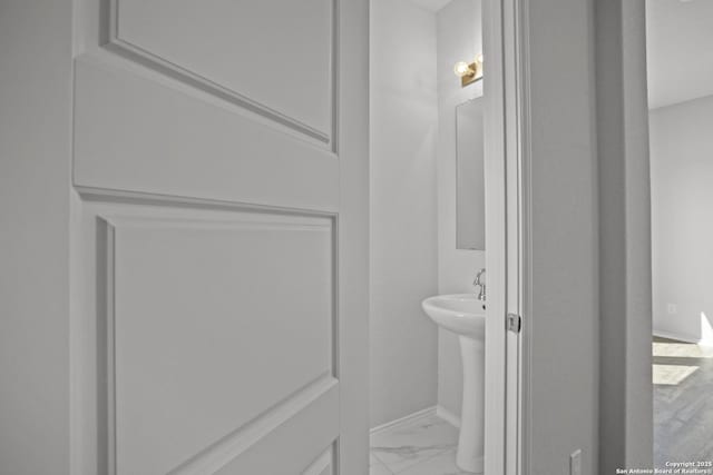 10257 Bartenheim Dr, Schertz, TX 78154 - bathroom with baseboards and marble look tiles