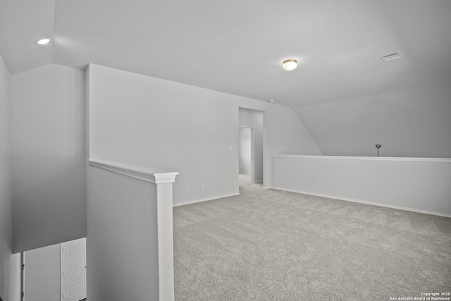 10257 Bartenheim Dr, Schertz, TX 78154 - bonus room with lofted ceiling, carpet floors, and baseboards