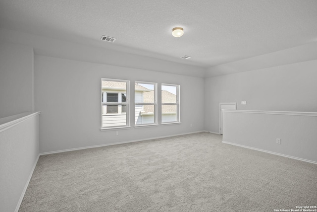 10257 Bartenheim Dr, Schertz, TX 78154 - empty room with a textured ceiling, carpet flooring, and baseboards