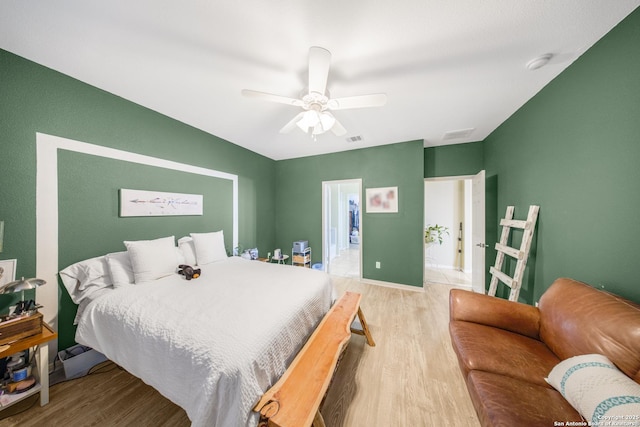 bedroom featuring ceiling fan and light wood-type flooring