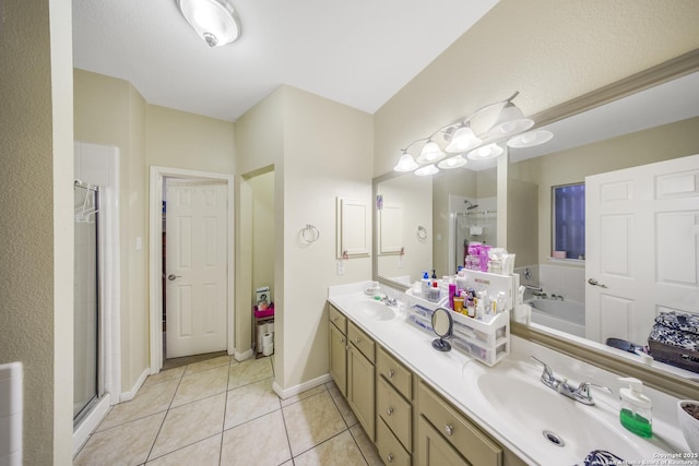 bathroom featuring vanity, tile patterned floors, and independent shower and bath