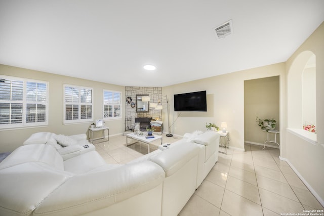 living room with light tile patterned flooring