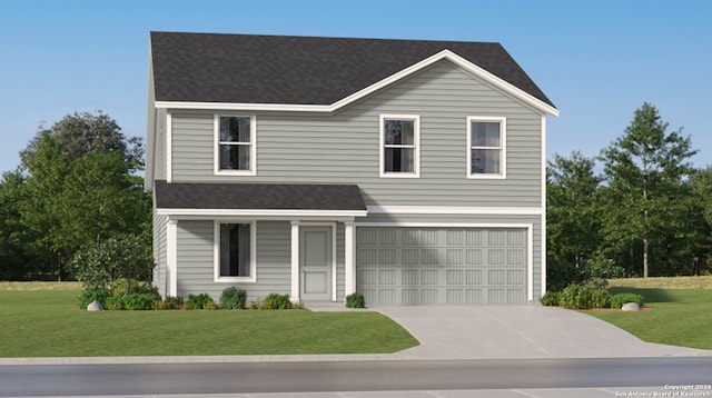 view of front of home featuring a garage and a front yard