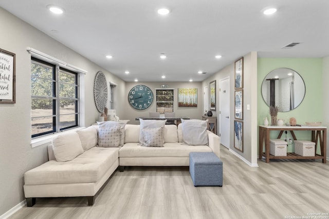 living room featuring light wood-type flooring