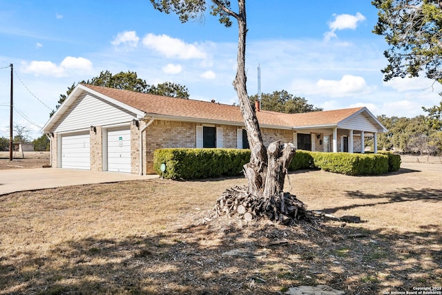 ranch-style home featuring a garage